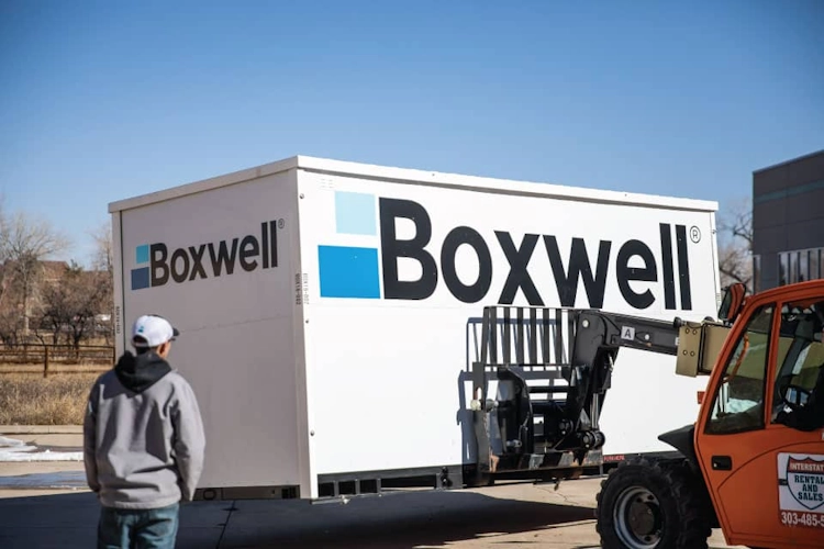 Manutention des containers portables Boxwell au chariot élévateur